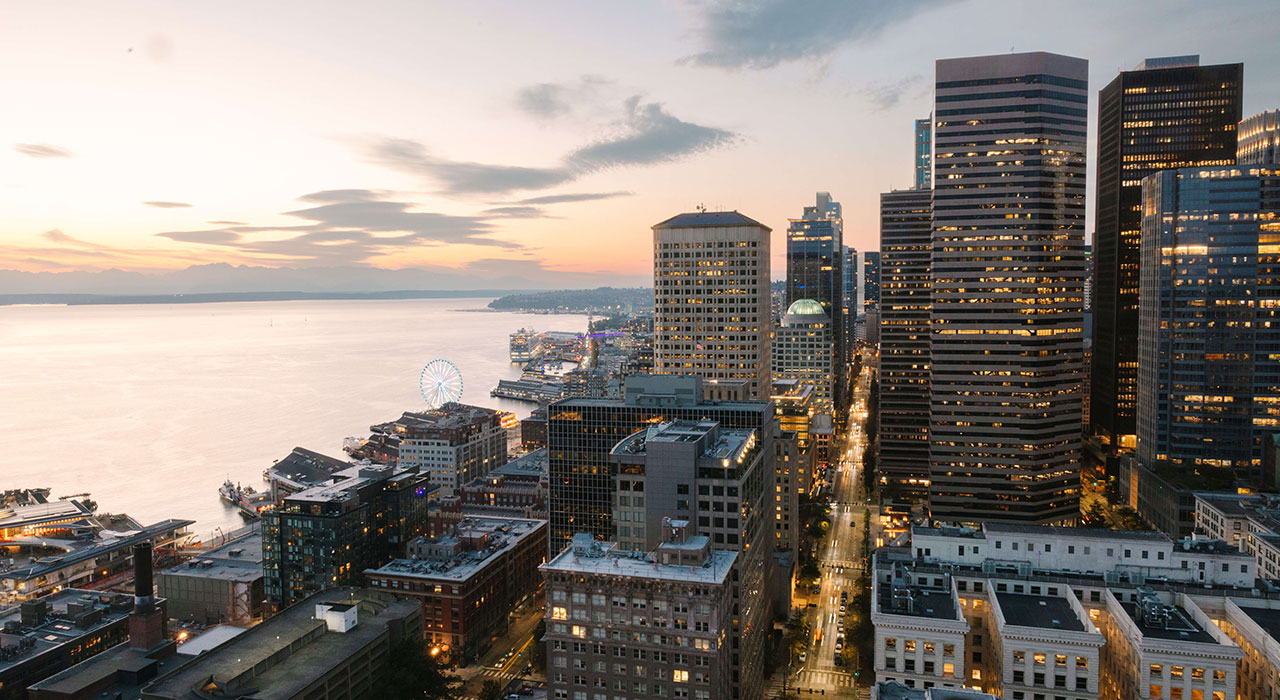 View of downtown Seattle and Puget Sound at sunset from Smith Tower - Saskia Potter